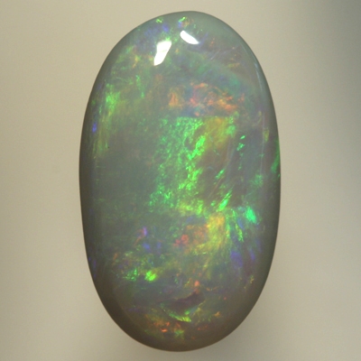 SOLID SEMI BLACK OPAL Orange and green move bright in rolling flashes